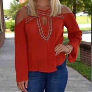 Orange Aztec cold shoulder top